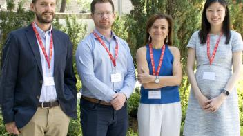 David Rapson among a group of peers at a Current Issues in Energy and Environmental Economics workshop.